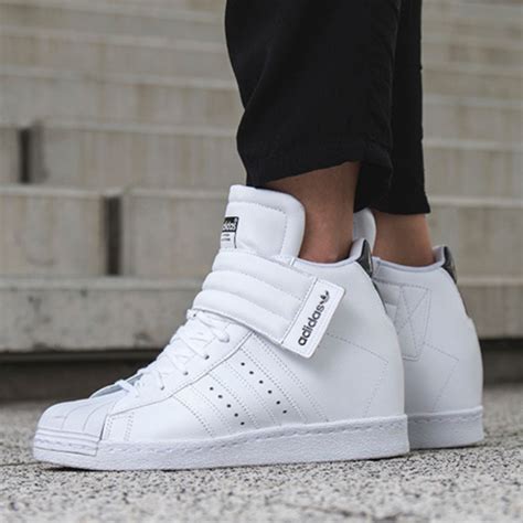 high top Adidas with strap